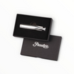 Curapipe Floppypipe in metallo cromato lucido con tre utensili a scomparsa, presentato in elegante scatola regalo nera.