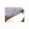Portatabacco avvolgibile Floppypipe in vera pelle color taupe, artigianale, Made in Italy, design morbido e compatto.