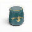 Set Floppypipe Sherlock Holmes in ceramica verde ottanio con vaso per tabacco, battipipa e posapipe con dettagli dorati