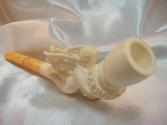 Pipa in schiuma di mare con donna